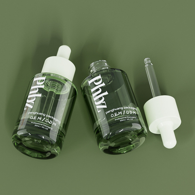 Bottiglia verde di vetro di lusso del siero delle bottiglie del contagoccia dell'OEM 30ML 1oz