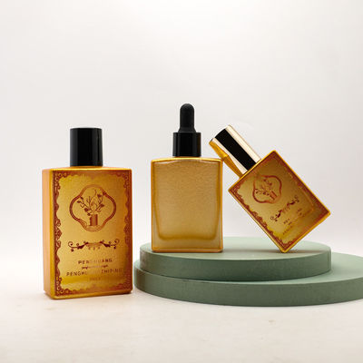 Bottiglia di vetro su misura del contagoccia dell'olio essenziale dell'olio 30ml 50ml 100ml dell'oro del siero di lusso vuoto cosmetico del quadrato