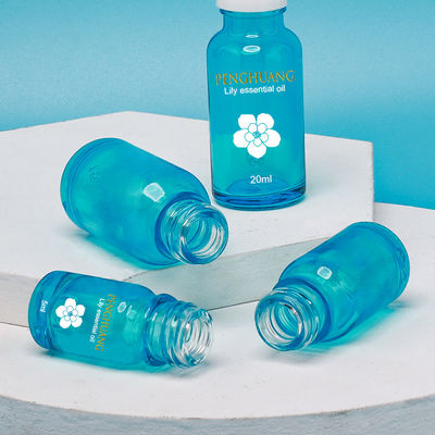 Bottiglia di vetro di Essentail del contagoccia di bambù blu dell'olio con Logo Printing su ordinazione