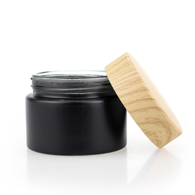 Il nero di bambù d'imballaggio cosmetico Matte Glass Jars 50g del coperchio a vite di colore dell'insieme