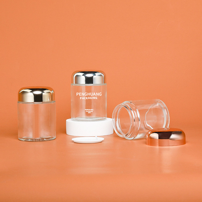 Contenitore rotondo di vetro della capsula 100g con il barattolo di vetro Packaing di Rose Golden Cap Sliver Cap