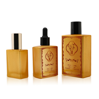 Il contagoccia dorato di vetro del siero di Lucury imbottiglia l'olio del profumo che imballa Logo Custom 50ml 100ml 120ml