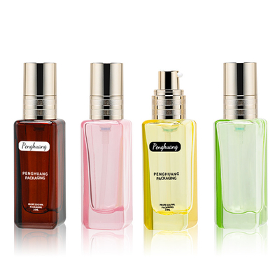 Il vetro dorato della lozione della pompa imbottiglia il verde rosa blu Amber Semi Color Transparent 30ml
