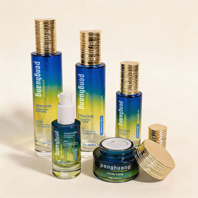 Set di bottiglie di vetro a gradiente di lusso personalizzato per la cura della pelle e l'imballaggio di bellezza OEM ODM Cosmetic Glass Bottle Set con barattolo